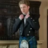 Man wearing full formal kilt outfit featuring a black Prince Charlie Jacket.