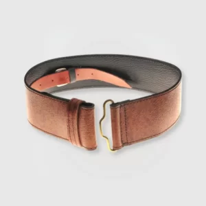 Pigskin leather sporran belt placed in a circle on a plain background