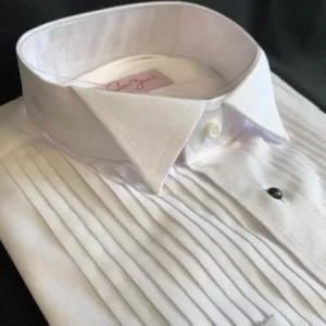 White dress shirt with wing collar and pleated front.